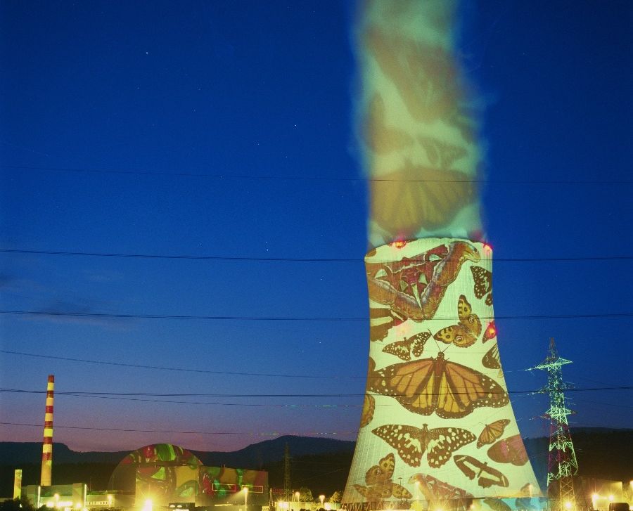 Illuminated projections of butterflies on the Gösgen Nuclear Power Plant, Kernkraftwerk Gösgen-Däniken AG. Projection by light artist Gerry Hofstetter.